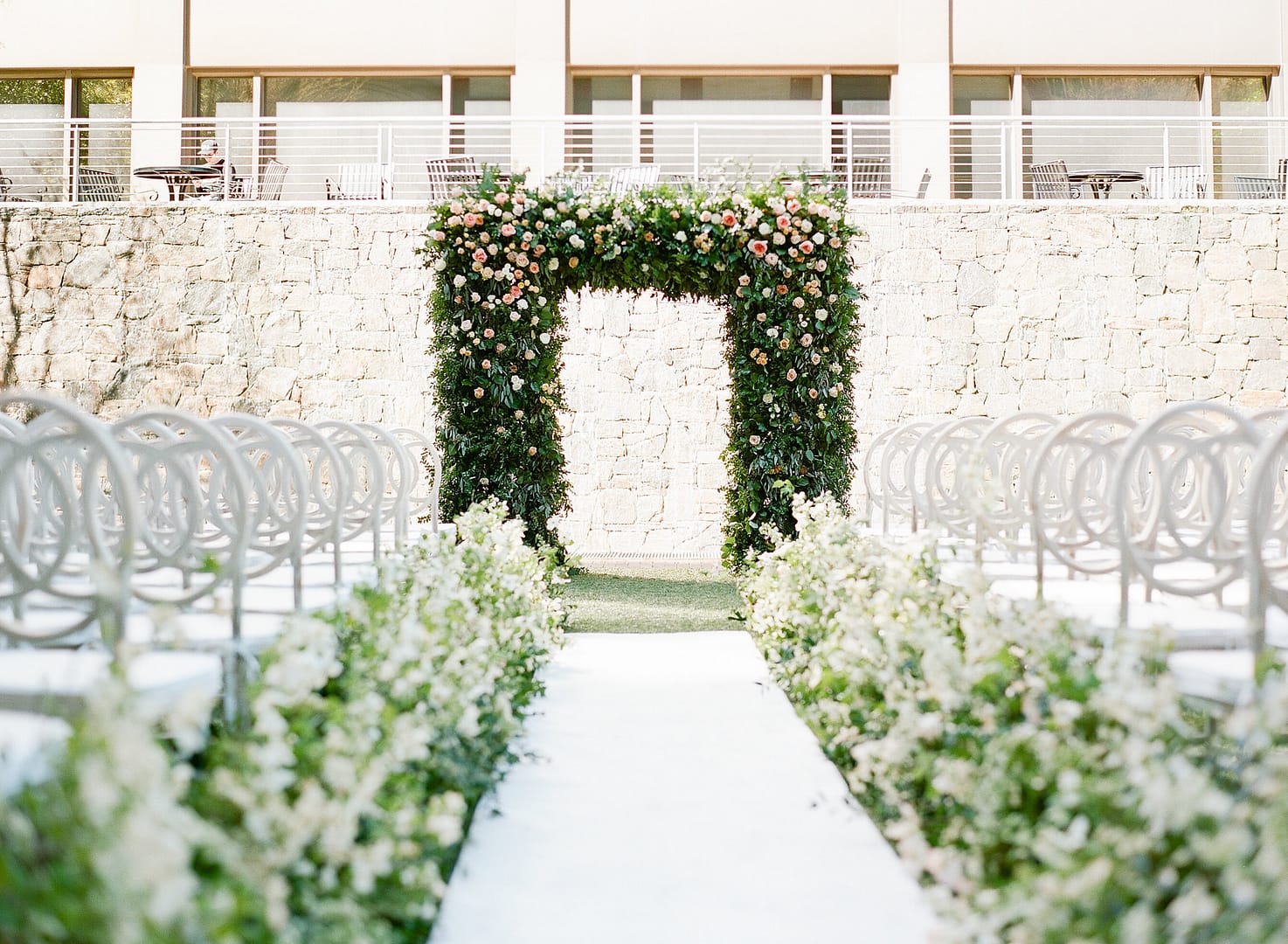 rooftop wedding floral aisle runner floral arch outdoor ceremony wedding